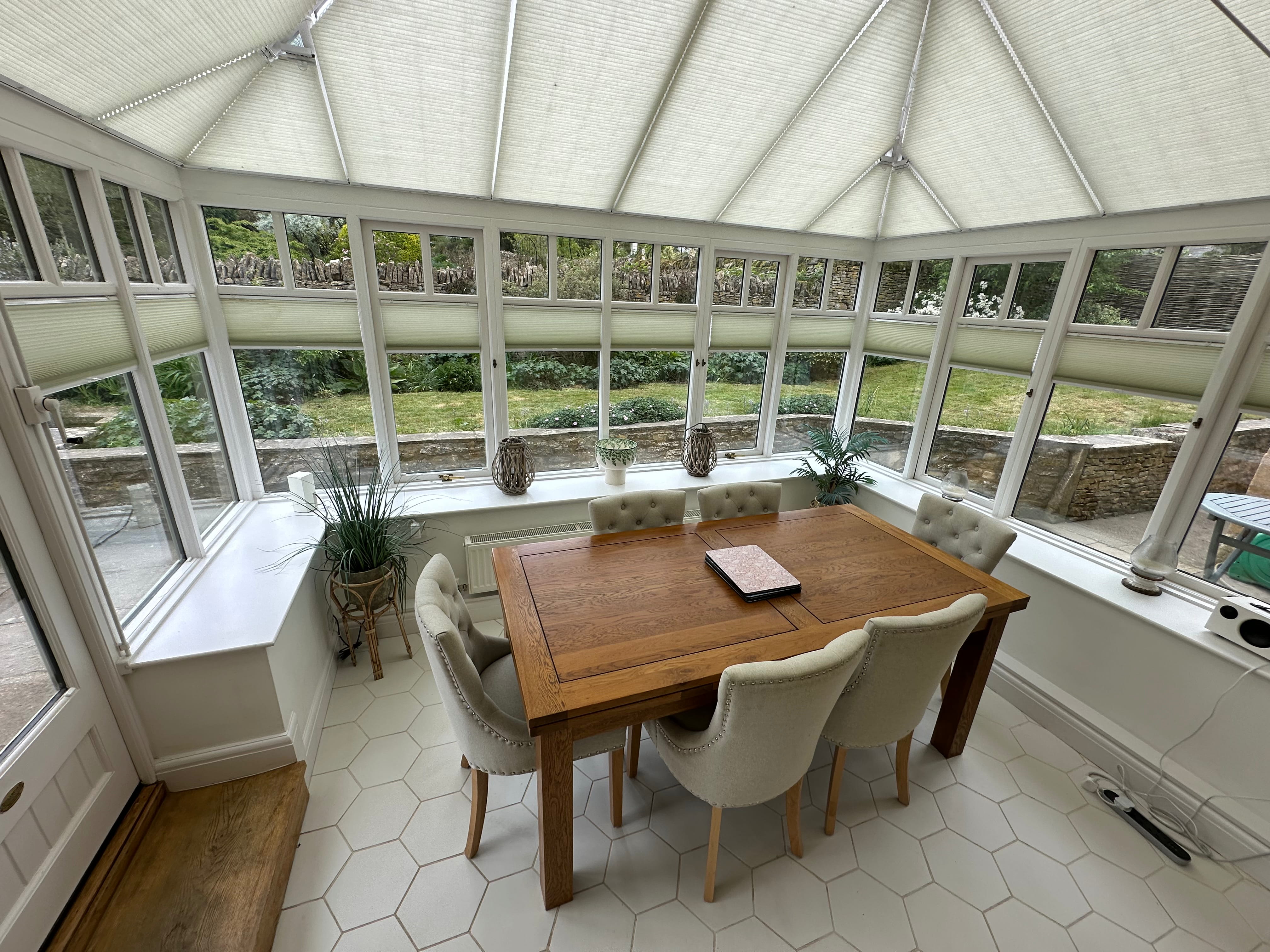 Conservatory dining area at Glebe Cottage, Bledington