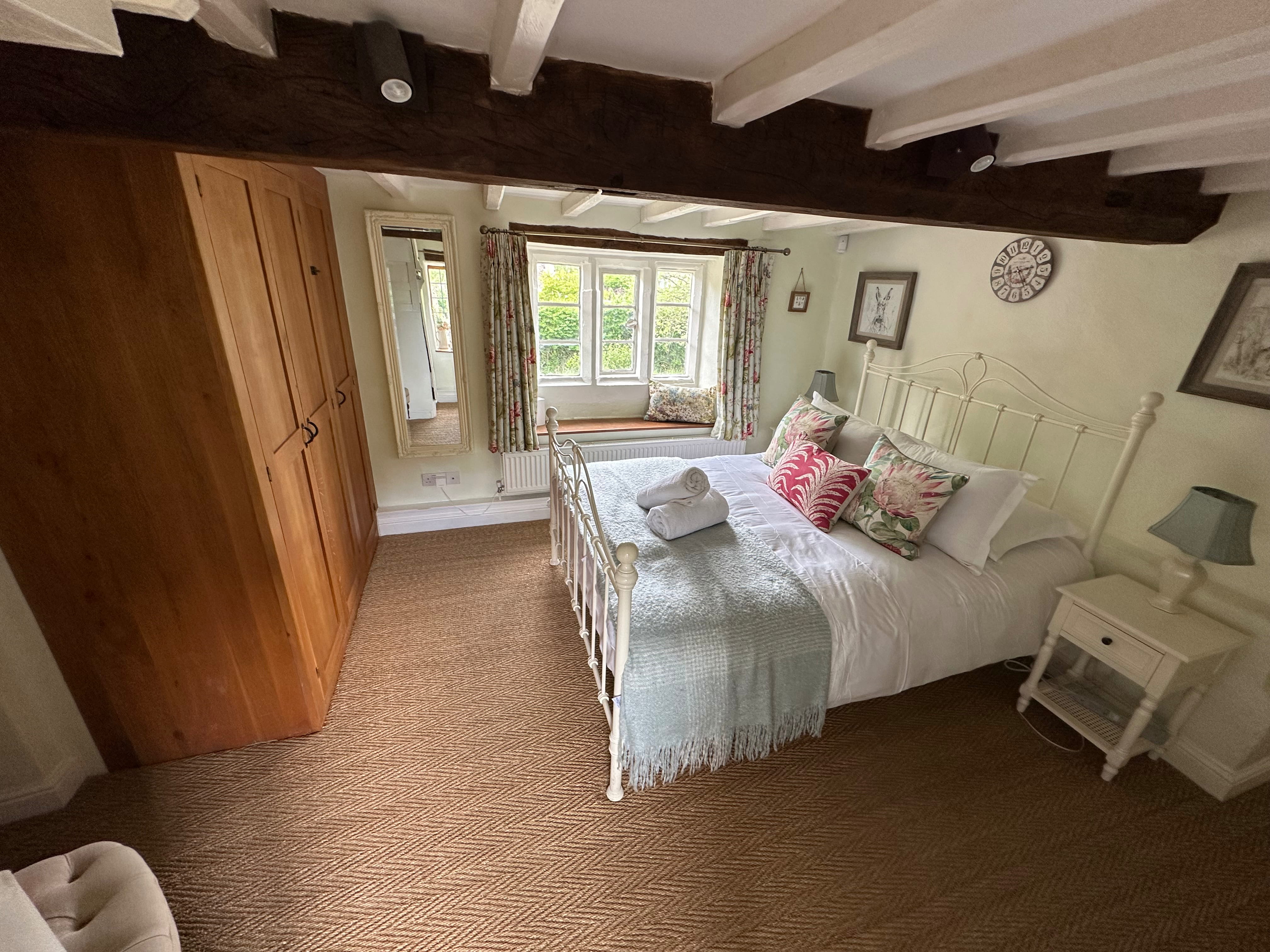 Principal bedroom at Glebe Cottage, Bledington