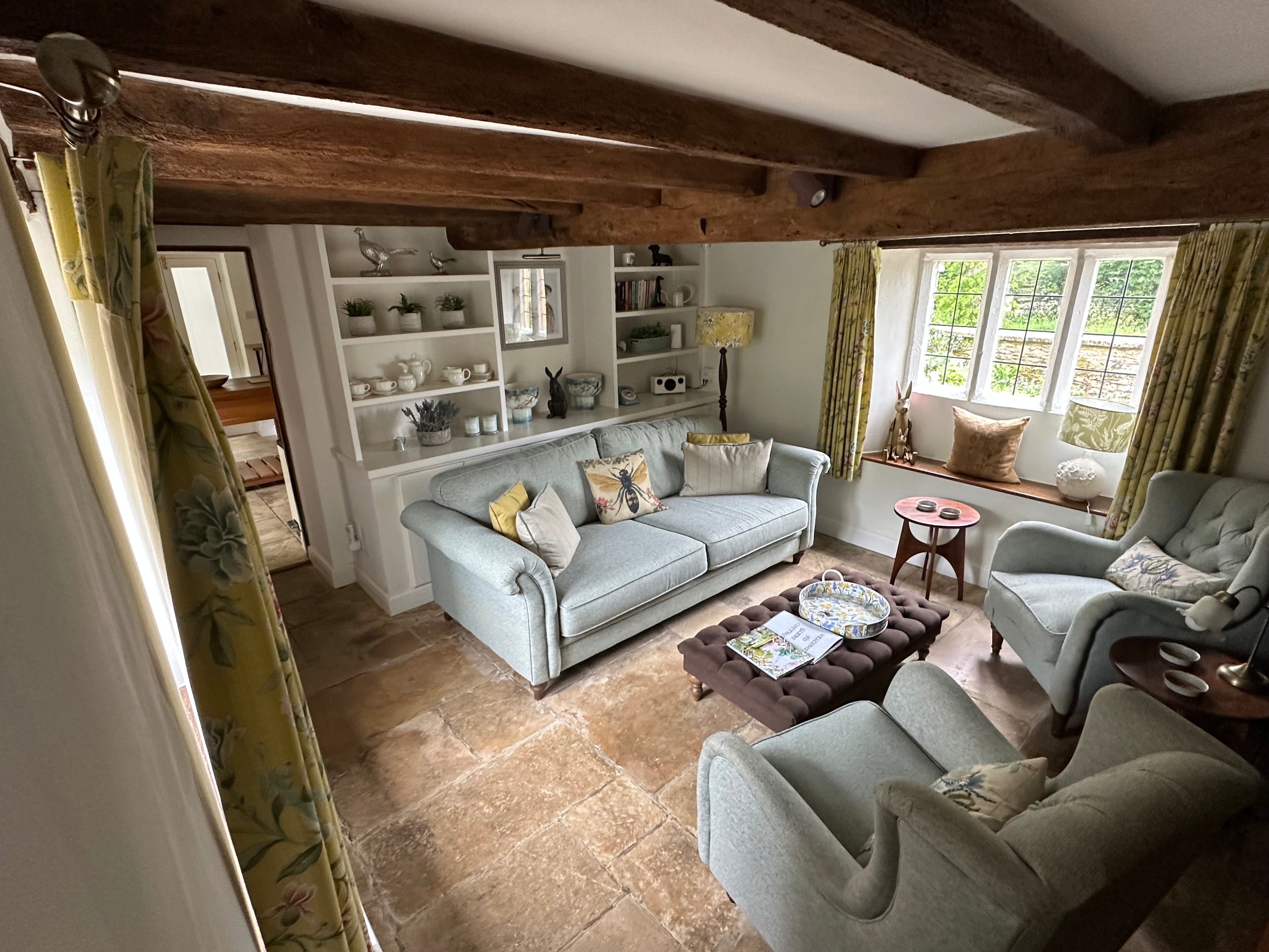The snug sitting room at Glebe Cottage, Cotswolds